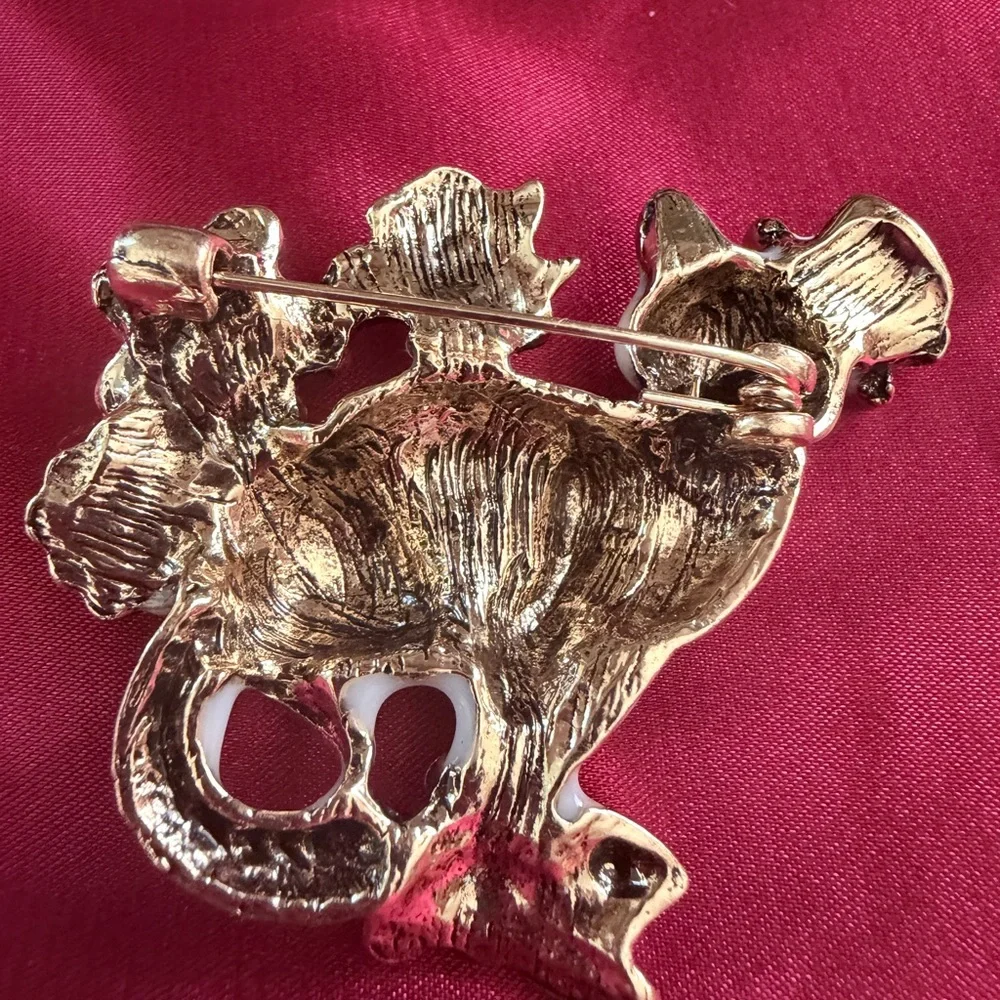 Elegant White Cat Brooch with Pink Floral Accents